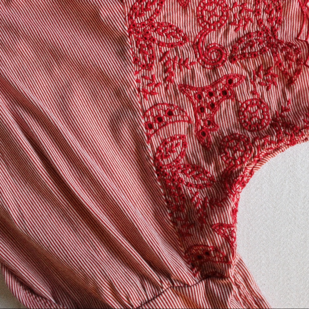 red v-neck top